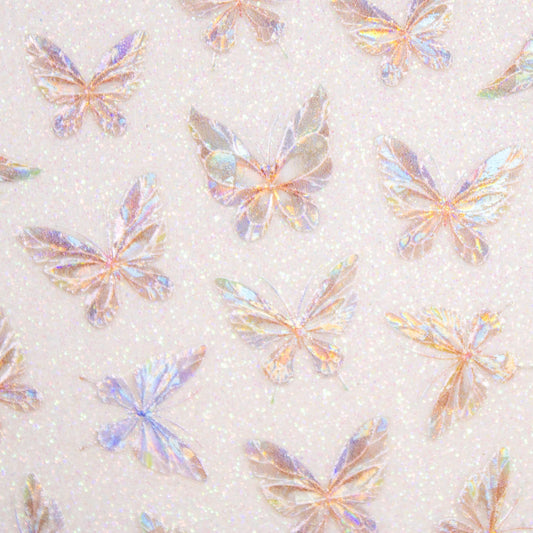 Close-up view of reflective butterfly nail stickers showing color-shifting glow.
