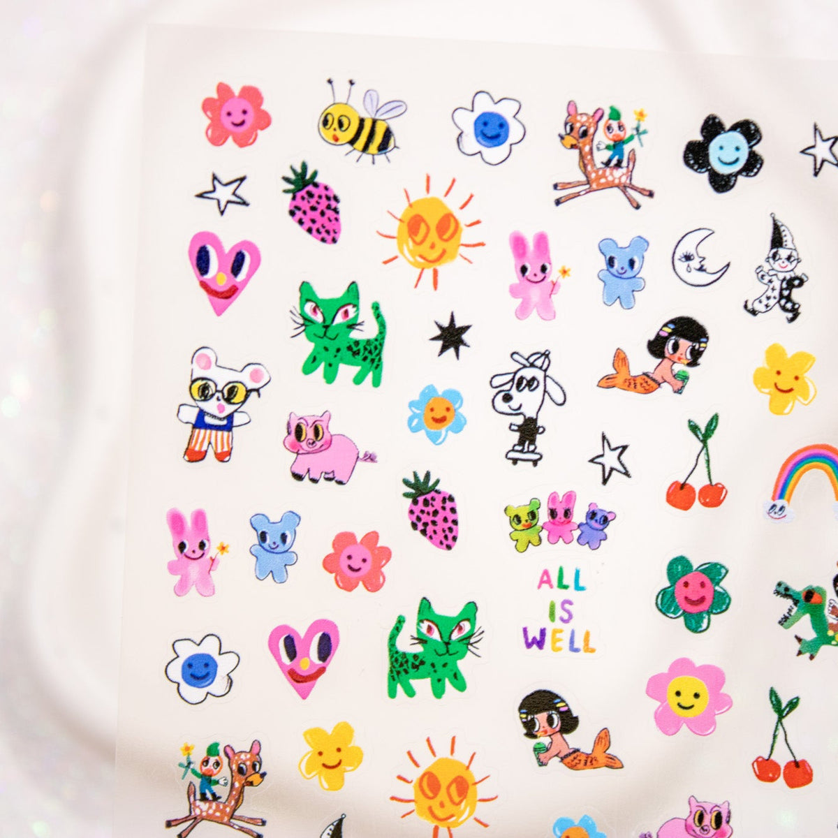Top view of All Is Well retro-kawaii doodle nail stickers.