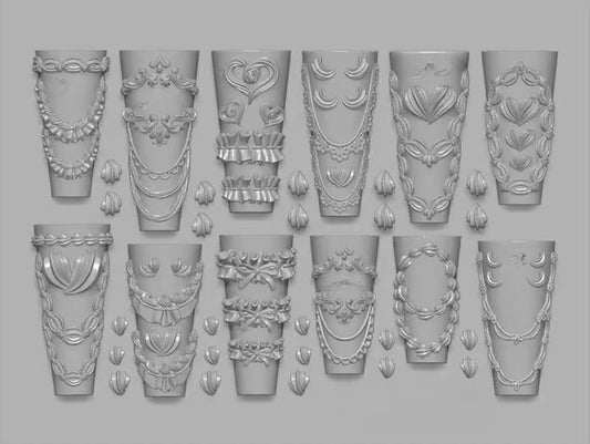Photo showing rows of rococo frame and cake frosting design cavities.