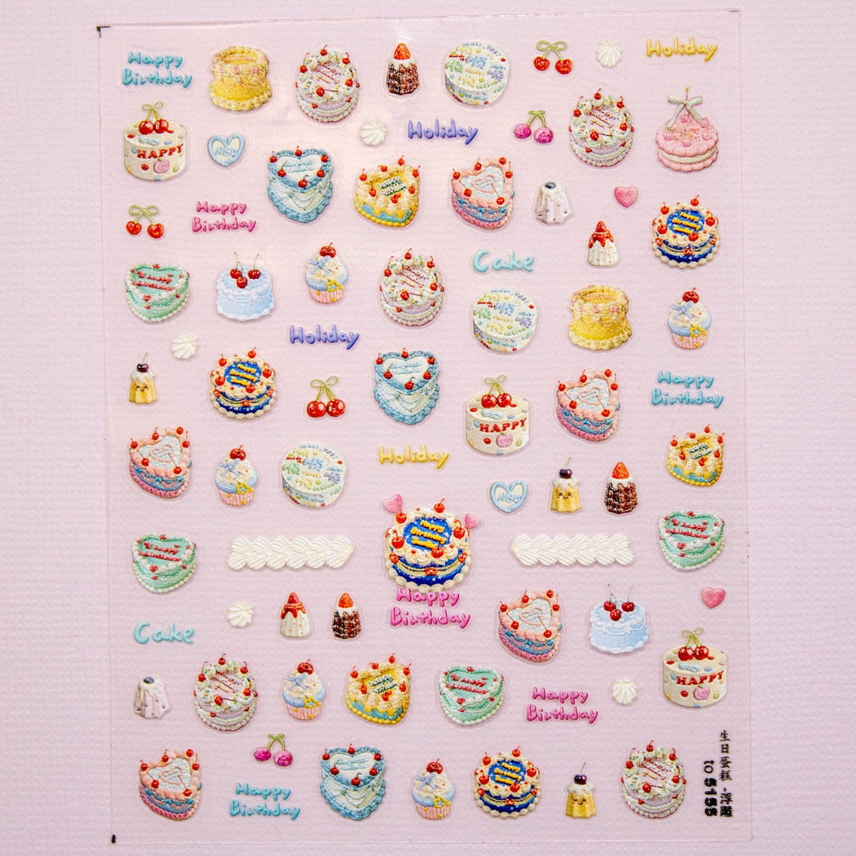 Full flat lay view of the Birthday Cake Nail Stickers decal sheet on a pink background.