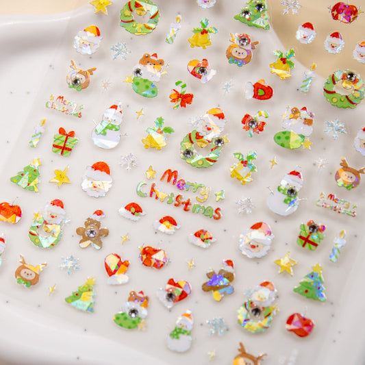 Holly Jolly Christmas nail sticker sheet resting on a clear container lid showcasing various holiday decals.