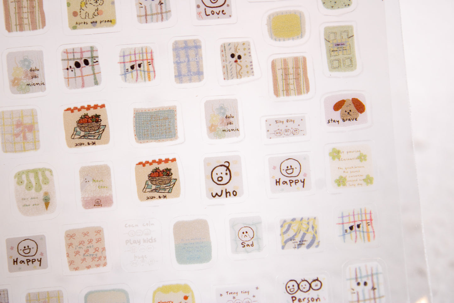 Korean style doodle nail stickers featuring plaid, hearts, and cute hand-drawn designs for DIY manicures.