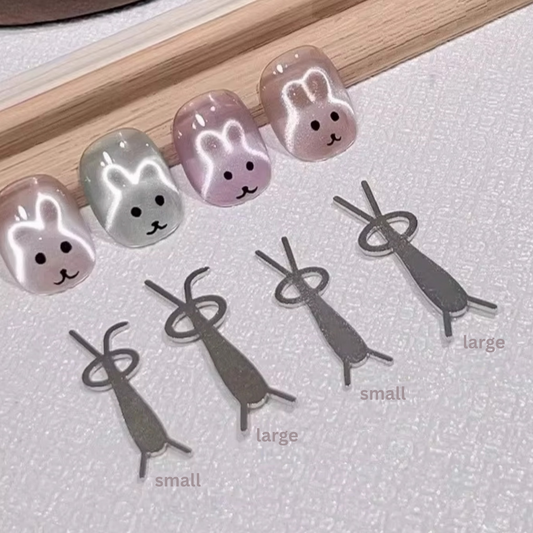 Bunny shape magnetic plates and cat eye gel nail swatches.