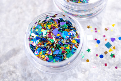 Colorful confetti nail glitter mix with stars, hearts, circles, and fun shapes.