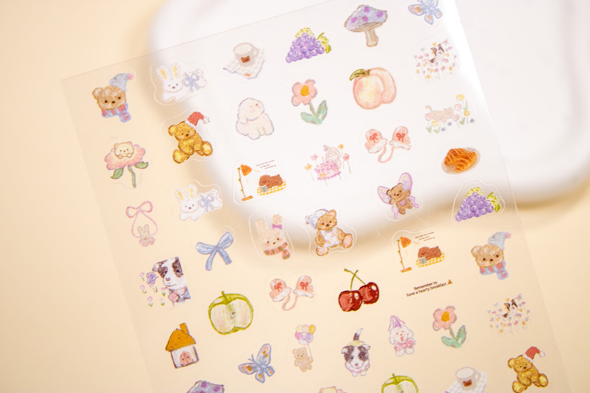 Cottagecore bear and bunny nail sticker sheet with cherries, ribbons, and cozy picnic designs.