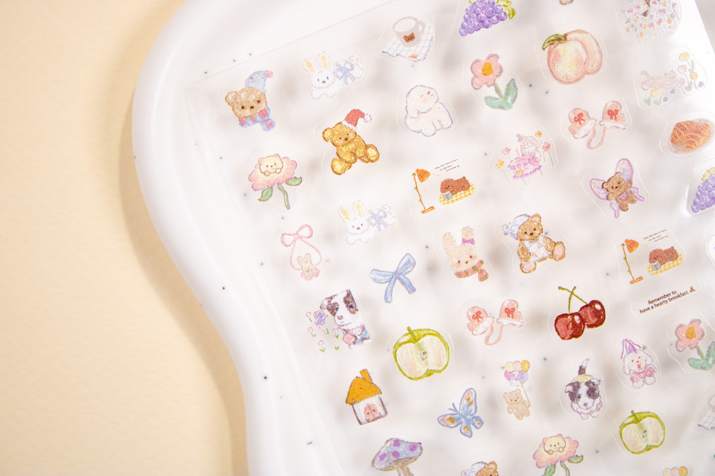 Cottagecore nail stickers featuring bears, bunnies, cherries, and ribbon picnic designs.