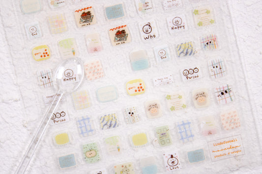 Cute doodle nail stickers featuring plaid patterns, hearts, flowers, and hand-drawn kawaii nail art designs.