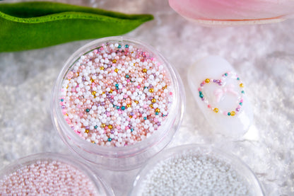 Sweet mix micro pearl beads for cute Korean nail art accents.